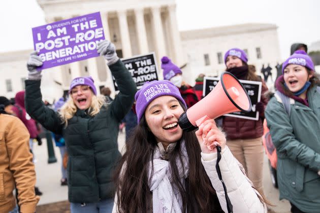 Demonstrators walk on First Street in Washington during the annual 49th March for Life anti-abortion demonstration ahead of a 2022 ruling that could overturn Roe v. Wade. (Photo: Tom Williams via Getty Images)