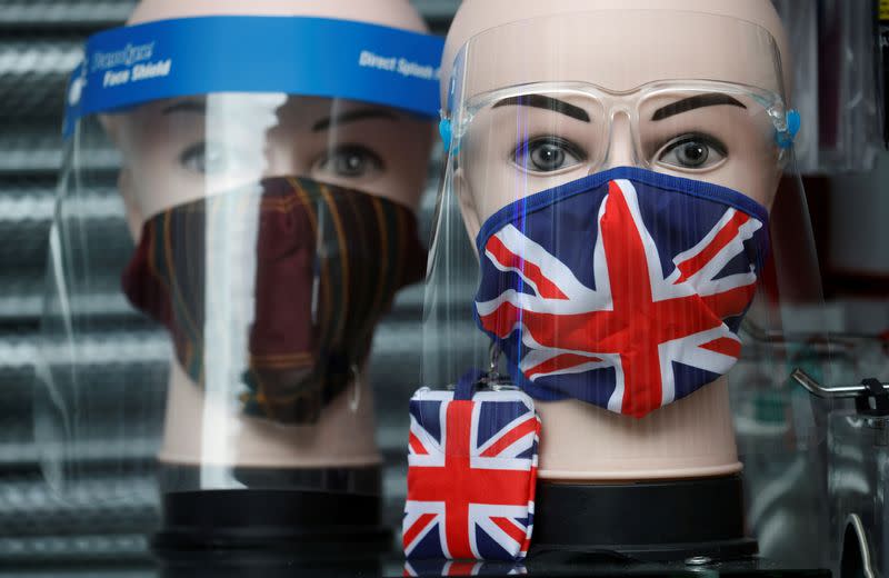 FILE PHOTO: A Union Jack design face mask is seen for sale in the window of a shop amid the outbreak of the coronavirus disease (COVID-19) in Manchester