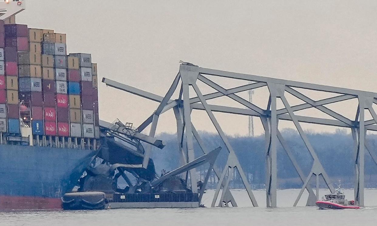 <span>Investigators have begun collecting evidence from the container ship that hit the Francis Scott Key Bridge in Baltimore.</span><span>Photograph: Matt Rourke/AP</span>