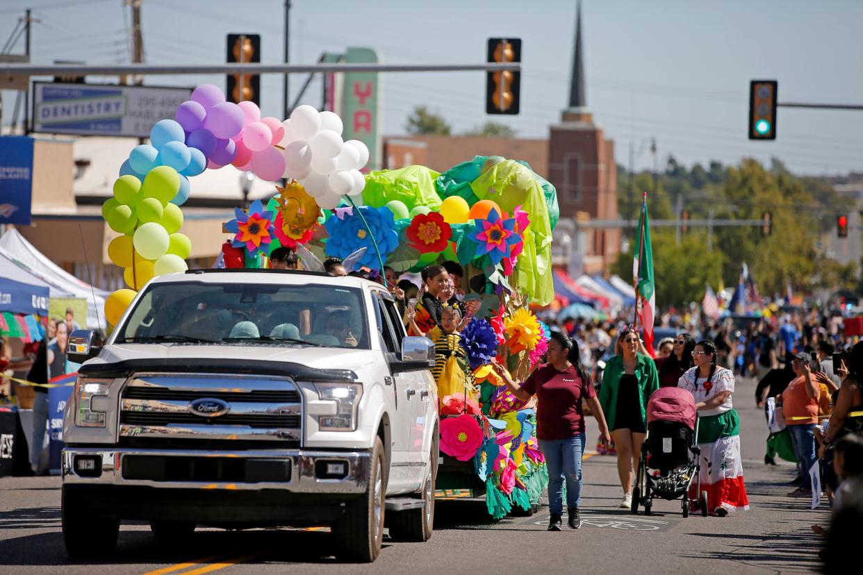 A truck pulls a float in the Fiestas de las Americas parade during the annual festival in the Capital Hill area of Oklahoma City, Saturday, Oct. 1, 2022. 