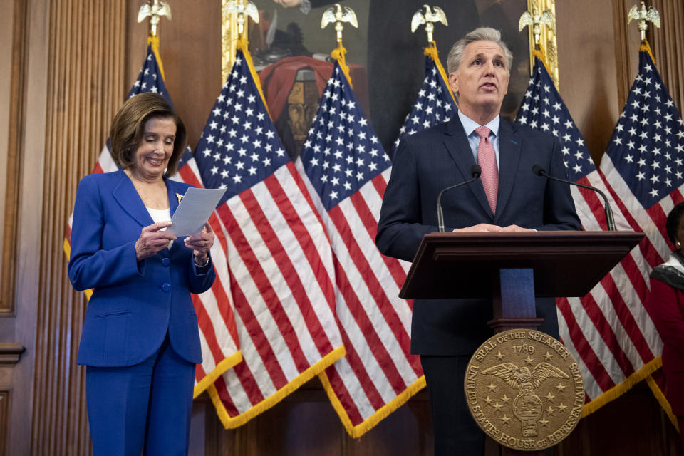 UNITED STATES - MARCH 27: House Minority Leader Kevin McCarthy of Calif., accompanied by Speaker of the House Nancy Pelosi, D-Calif., speaks during a bill enrollment ceremony for the Coronavirus Aid, Relief, and Economic Security (CARES) Act, after it passed in the House, in Washington on Friday, March 27, 2020.  (Photo by Caroline Brehman/CQ-Roll Call, Inc via Getty Images)