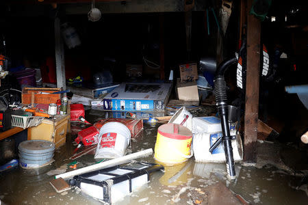 A flooded basement is seen at a home on South 19th Street after an overflowed Coyote Creek flooded neighborhoods and prompted evacuation of more than 14,000 residents in San Jose, California, U.S., February 22, 2017. REUTERS/Stephen Lam