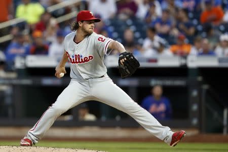 Jul 9, 2018; New York City, NY, USA; Philadelphia Phillies starting pitcher Aaron Nola (27) pitches against the New York Mets during the first inning at Citi Field. Mandatory Credit: Adam Hunger-USA TODAY Sports