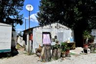 The River Village Roma camp in Italy has no running water, and the water that the camp's inhabitants use is delivered in bottles by a private company