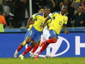 Ecuador's Enner Valencia (R) celebrates after scoring a goal during their 2014 World Cup Group E soccer match against Honduras at the Baixada arena in Curitiba June 20, 2014. REUTERS/Darren Staples (BRAZIL - Tags: SOCCER SPORT WORLD CUP)