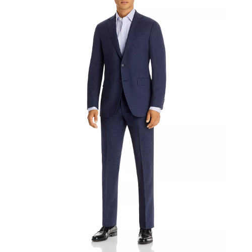 man wearing navy Sid Mashburn suit