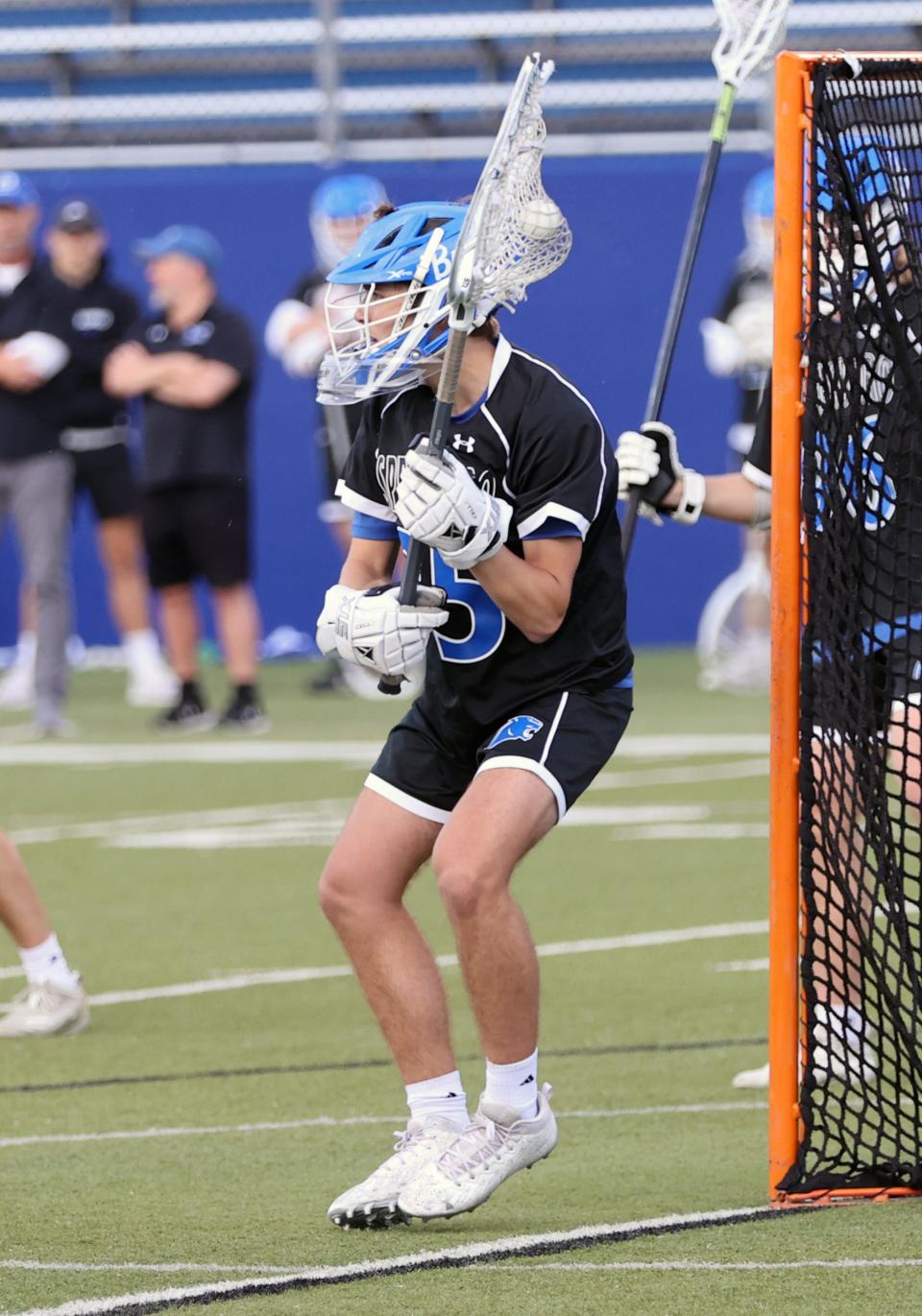 Springboro goalkeeper Scottie Michaud puts the ball back in play after a save in the Division I regional championship game at Saint Xavier May 27, 2022.