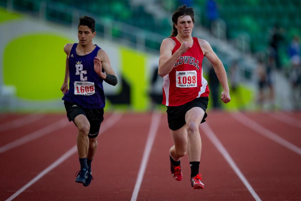 Lowell's Rowan Files wins the boys 200 meters Friday, May 20, 2022, during the OSAA State Track & Field Championships at Hayward Field.