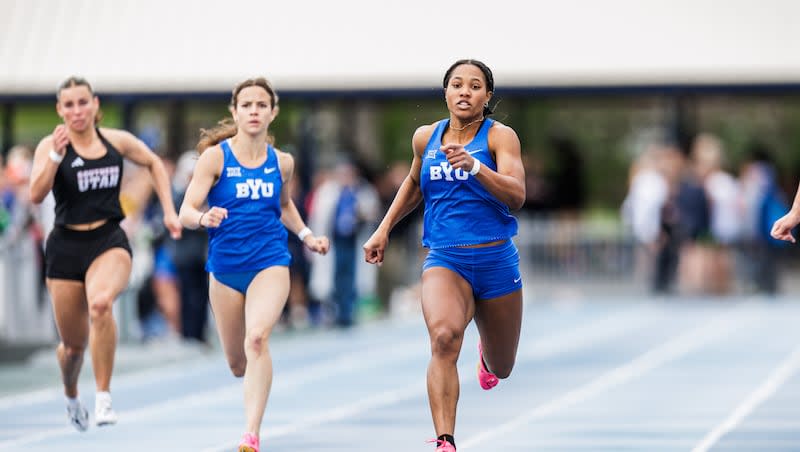 BYU sprinter Jaslyn Gardner, right, the broke school records in both the 100- and 200-meter races at the Robison Invitational on April 27, 2024, in Provo.
