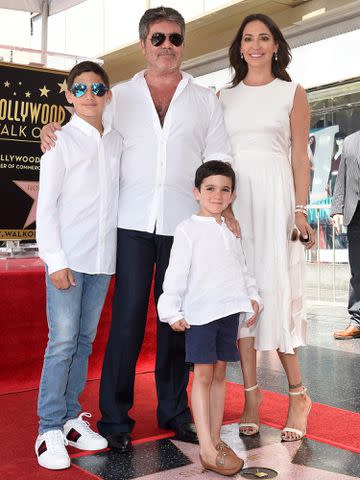 <p>Axelle/Bauer-Griffin/FilmMagic</p> Simon Cowell, Lauren Silverman, Eric Cowell and Adam Silverman on the Hollywood Walk of Fame in 2018