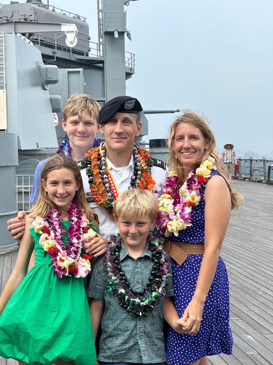 Col. Philip D. Cordaro, a Honesdale native, was promoted to his present rank in the U.S. Army during a ceremony on April 5, 2024, on deck of the USS Missouri at Pearl Harbor. Cordaro is pictured surrounded, from left counterclockwise, by his children, oldest son Luca, daughter Aida and younger son Antonio, and his wife, Sarah. He is presently stationed in Hawaii.