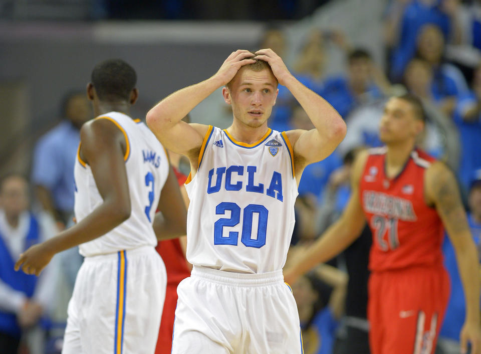 UCLA guard Bryce Alford, center, reacts to a call that went against them during the second half of an NCAA college basketball game against Arizona, Thursday, Jan. 9, 2014, in Los Angeles. (AP Photo/Mark J. Terrill)