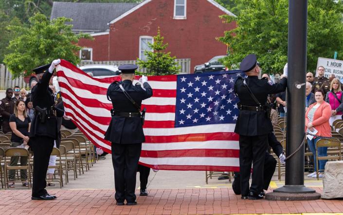 Officers participate in the St. Clair County Law Enforcement Memorial Service Tuesday at the sheriff’s department off North Fifth Street in Belleville.