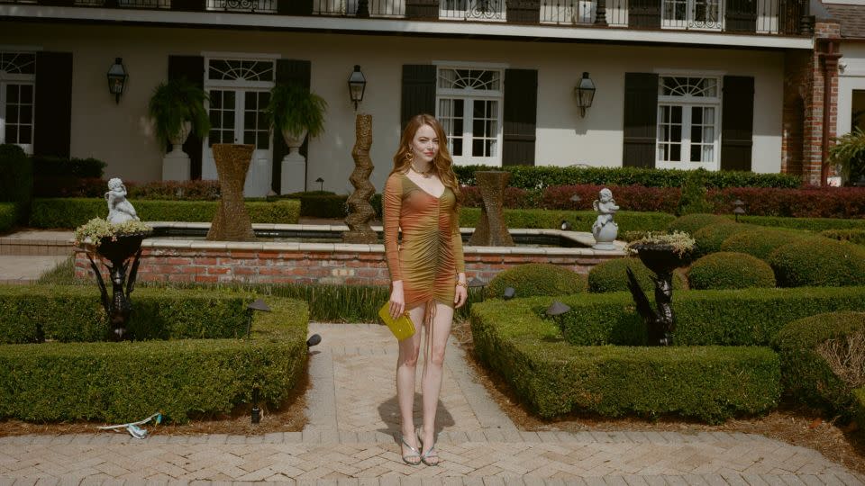 Emma Stone plays three characters across three stories in Yorgos Lanthimos's "Kinds of Kindness," and her wardrobe journey reflects that. - Yorgos Lanthimos/Searchlight Pictures