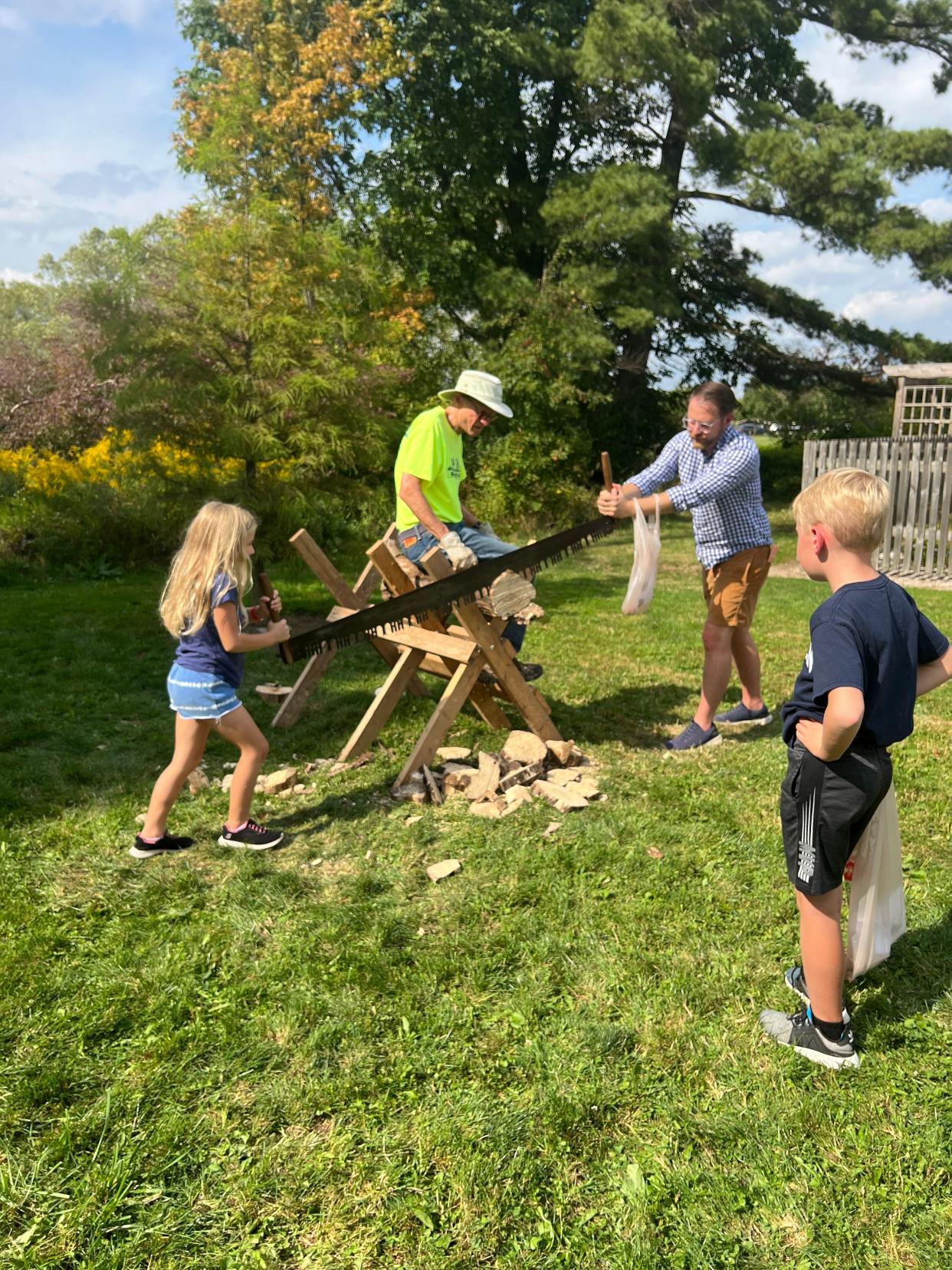 Those coming to the Case-Barlow Farm's annual fall festival can try their hand at several outdoor farm chores, such as sawing a log.