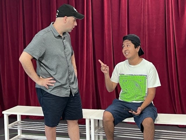 Scott Ehrenpreis, left, stars as an out-of-work youth baseball manager struggling with a variety of problems – including apocalpytic visions – in Douglas Gearhart’s “The Manager” at the Players Centre for Performing Arts.  Jhonny Lopez-Lopez plays his son, Axl.