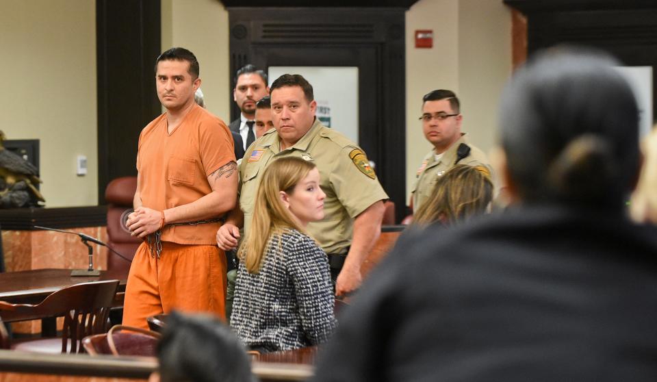 Juan David Ortiz leaves the 406 District Court after his arraignment in January 2019, at the Webb County Justice Center in Laredo, Texas. Ortiz, a former U.S. Border Patrol agent, has pleaded not guilty to capital murder and other charges in the Sept. 2018 killings of four women who prosecutors say were sex workers.