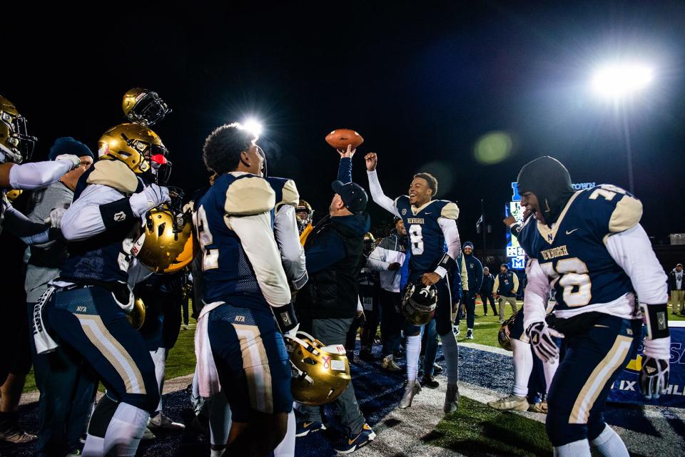 Newburgh celebrates their win during the NYSPHSAA Class AA semifinall football game in Middletown, NY on Saturday, November 26, 2022. Newburgh defeated Christian Brothers Academy. KELLY MARSH/FOR THE TIMES HERALD-RECORD