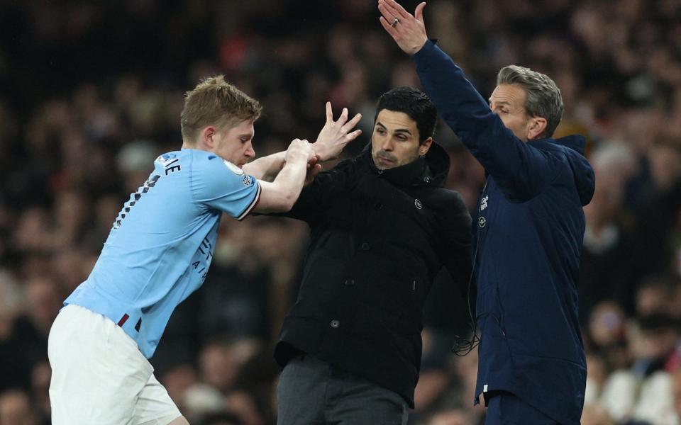 Arsenal v Manchester City - Emirates Stadium, London, Britain - February 15, 2023 Arsenal manager Mikel Arteta clashes with Manchester City's Kevin De Bruyne - REUTERS