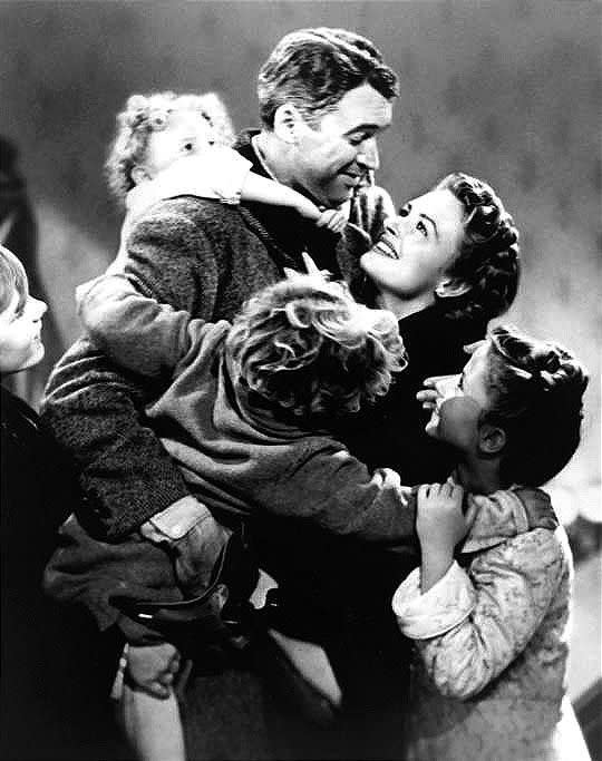 Jimmy Stewart, center, stars as businessman George Bailey in the 1946 Christmas classic “It’s a Wonderful Life.”