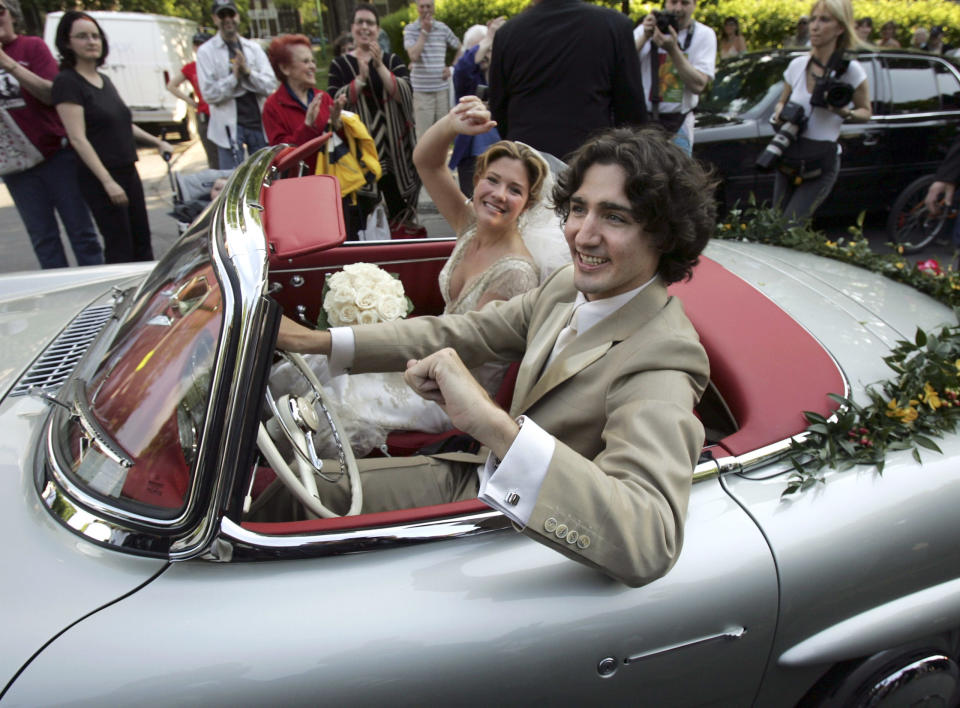 <p>Leaving their wedding ceremony at the Sainte-Madeleine D'Outremont Church in Montreal, Canada</p>