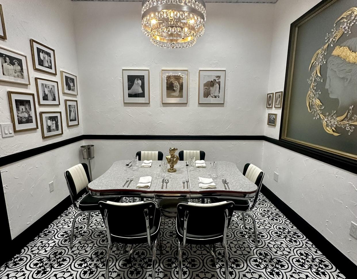 The vintage table in the private dining room at Tavolena Italian restaurant in Jupiter once belonged to chef/owner Michael Rolchigo's late grandmother Lena.