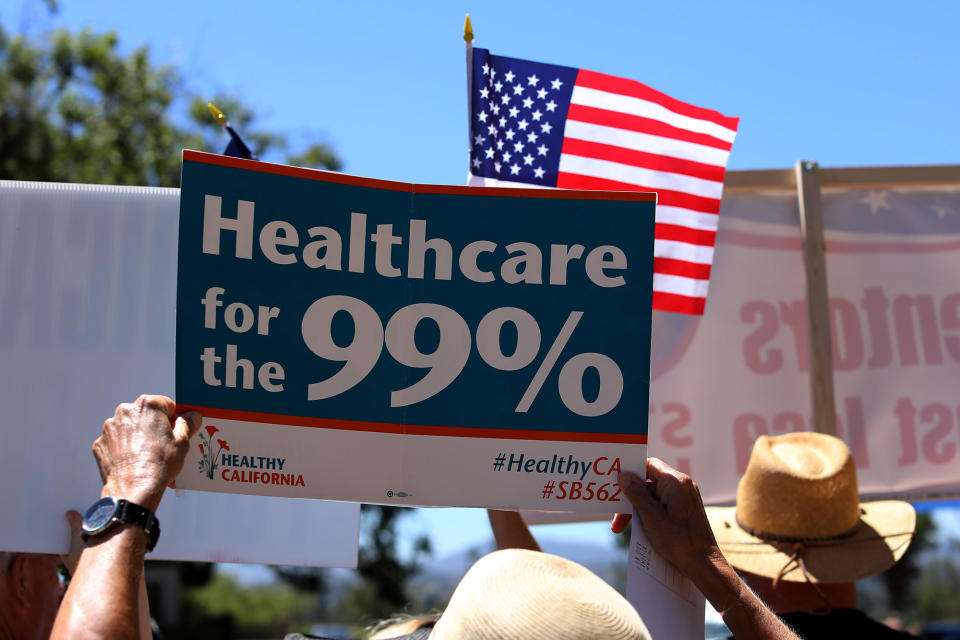 <p>Protesters demonstrate the Republican healthcare bill outside Republican Congressman Darrell Issa’s office in Vista, Calif., June 27, 2017. (Photo: Mike Blake/Reuters) </p>