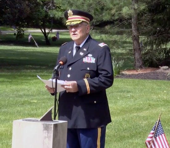 Retired Army Lt. Col. Barnard Kemter gives a Memorial Day speech in Hudson, Ohio.