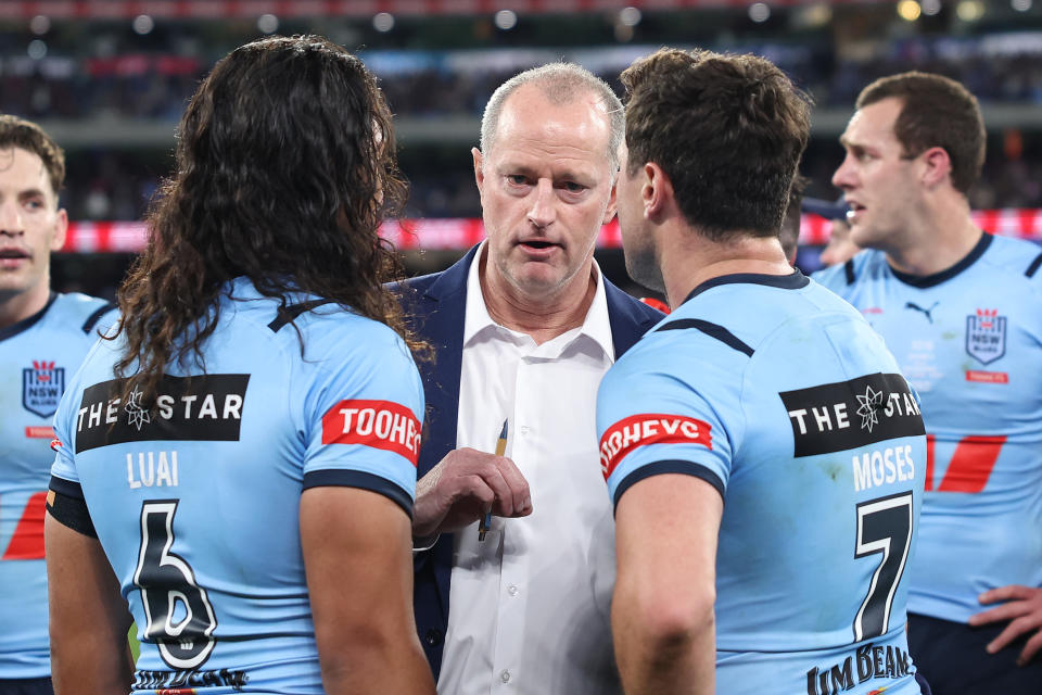 MELBOURNE, AUSTRALIA - JUNE 26:  NSW Blues coach Michael Maguire talks to Jarome Luai and Mitchell Moses of the Blues during game two of the men's State of Origin series between New South Wales Blues and Queensland Maroons at the Melbourne Cricket Ground on June 26, 2024 in Melbourne, Australia. (Photo by Cameron Spencer/Getty Images)