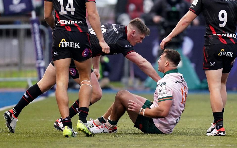 Owen Farrell's tinderbox character looks up as he pushes Shayne Bolton while the Connacht winger is down