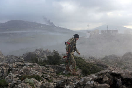 A Turkish-backed Free Syrian Army fighter is seen in Afrin, March 2. REUTERS/Khalil Ashawi