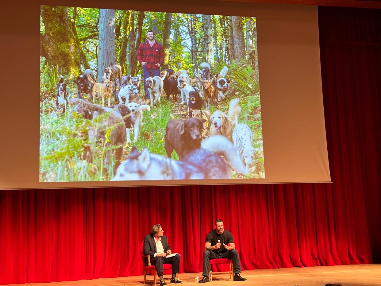 Renown animal rescue hero Lee Asher, right, speaks at Lynn University during a talk moderated by historian Robert Watson.