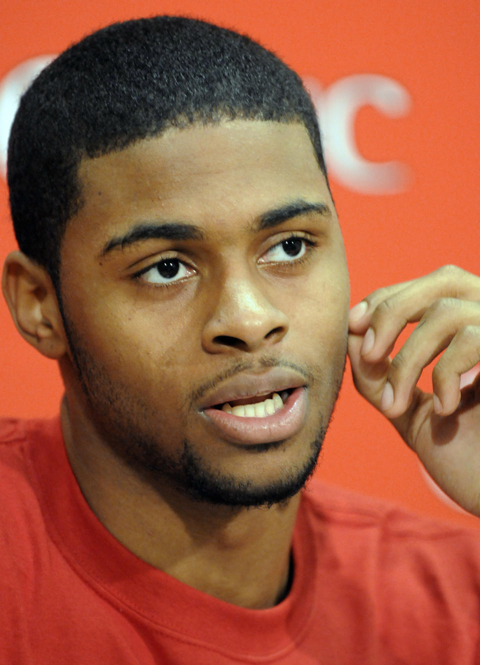 Louisville's Chane Behanan listens to a reporter's question during a news conference, Tuesday, March 27, 2012 in Louisville, Ky. Louisville will be facing Kentucky in the national semifinals of the NCAA college basketball tournament at the Final Four on Saturday in New Orleans. (AP Photo/Timothy D. Easley)