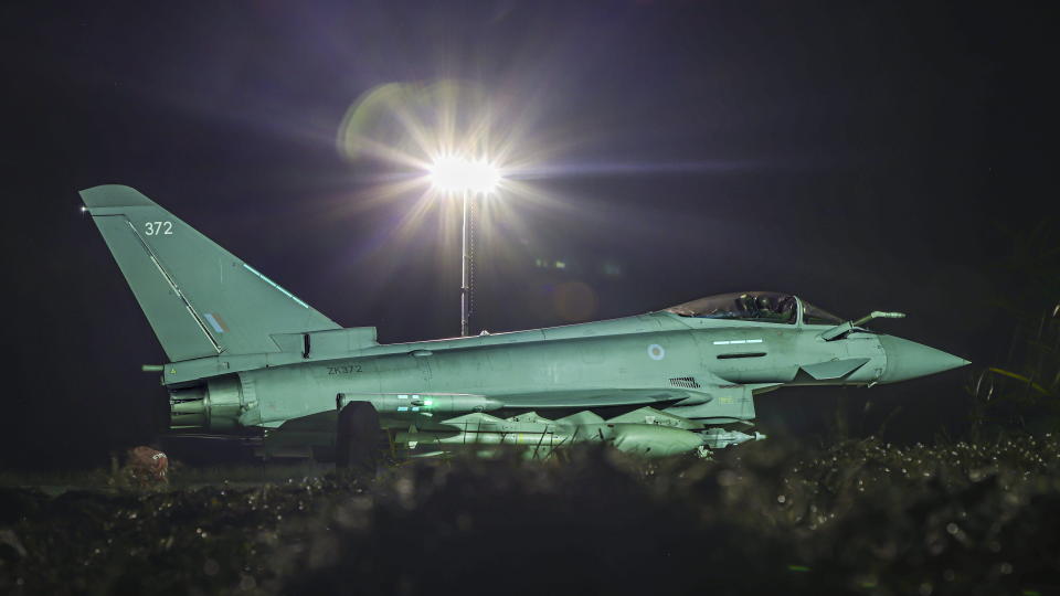 This photo issued by the Ministry of Defence (MOD) on Sunday, Feb. 4, 2024 shows a RAF Typhoon FGR4 aircraft returning to the base, following strikes against Houthi targets in Yemen. The U.S. and Britain struck 36 Houthi sites in Yemen in a second wave of assaults meant to further disable Iran-backed groups that have relentlessly attacked American and international interests in the wake of the Israel-Hamas war. In addition to the strikes on Saturday, U.S. Central Command says it conducted an additional “self-defense” strike on Sunday against a Houthi anti-ship cruise missile. (AS1 Leah Jones/RAF via AP)