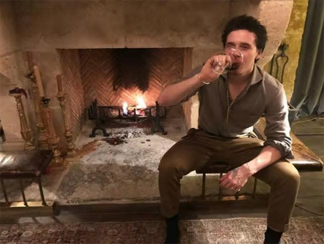 brooklyn-beckham-log-fire