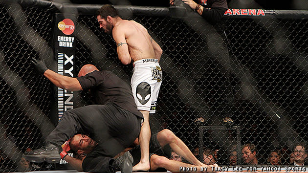 Matt Brown stands over Mike Swick after knocking him out in their fight at UFC on Fox 5. (Credit: Tracy Lee for Yahoo! Sports)