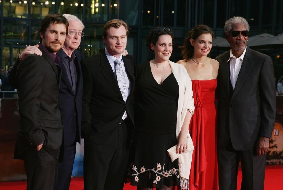 L-R: Christian Bale, Michael Caine, Christopher Nolan, Emma Thomas, Katie Holmes and Morgan Freeman arrive for the German premiere of ‘Batman Begins’, June 2005 (Getty Images)