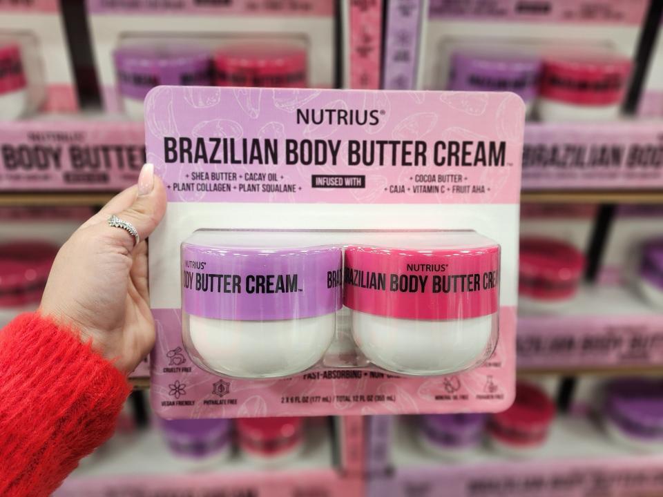 Two pack of Nutrius Brazilian body butter cream with pink and purple packaging
