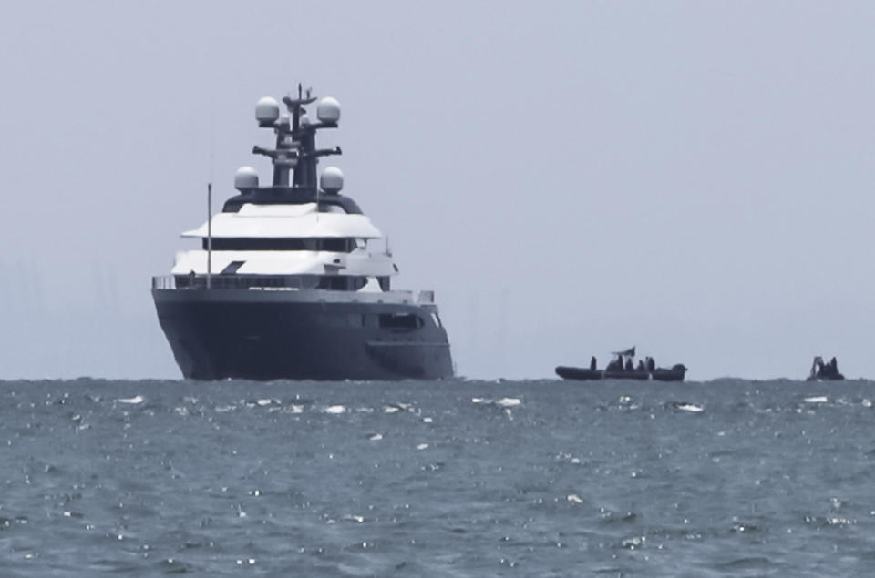 Luxury yacht "Equanimity" is anchored in the waters off Batam Island, Indonesia, Monday, Aug. 6, 2018. Malaysia's prime minister Mahathir Mohamad said Indonesia has handed over the luxury yacht allegedly bought with money stolen in the multibillion-dollar looting of a state investment fund. (AP Photo/Djalu)