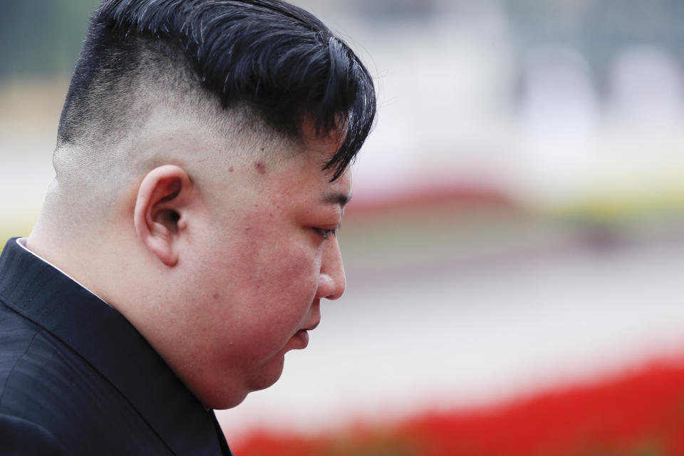 North Korean leader Kim Jong Un attends a wreath laying ceremony at Ho Chi Minh Mausoleum in Hanoi, Vietnam, Saturday, March 2, 2019. Kim has paid his respects to Vietnamese revolutionary leader Ho Chi Minh, whose embalmed body is on permanent display, just like Kim's own father and grandfather in North Korea. (Jorge Silva/Pool Photo via AP)