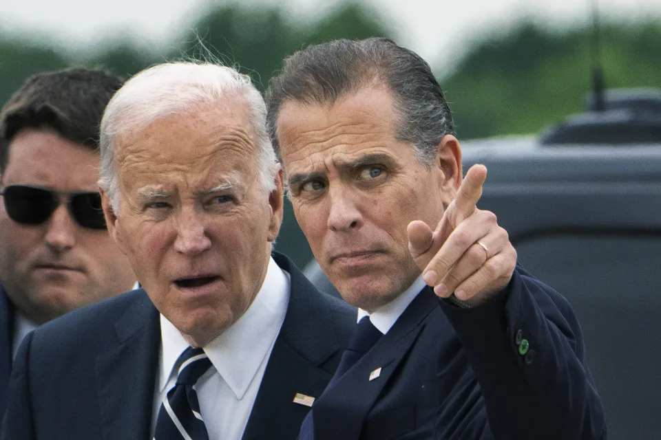 President Joe Biden talks with his son Hunter Biden as he arrives Delaware Air National Guard Base in New Castle, Del., Tuesday, June 11, 2024. (AP Photo/Manuel Balce Ceneta)