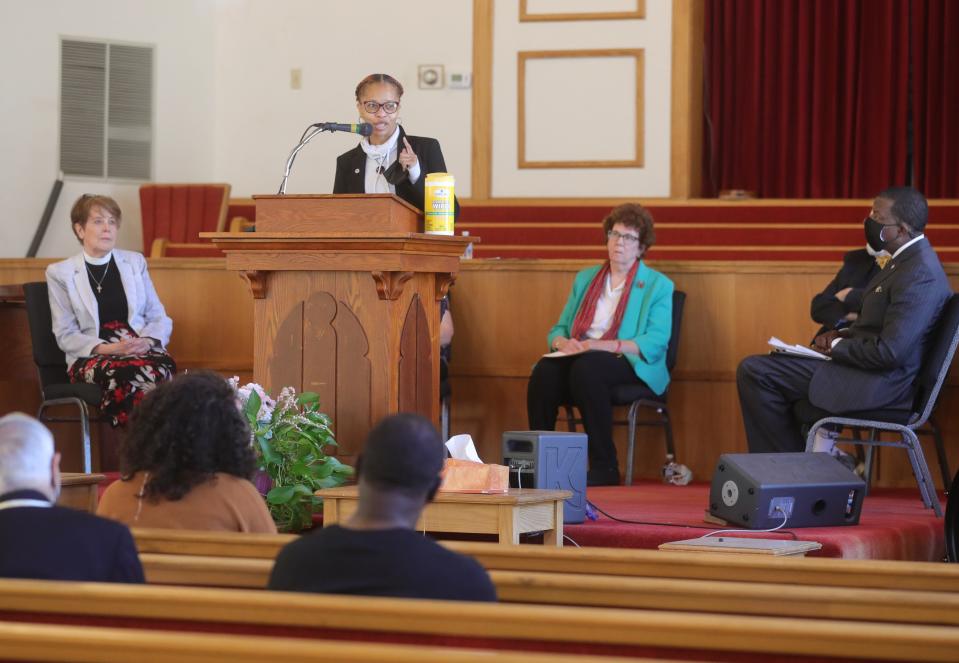 Akron City Councilwoman Tara Mosley speaks to a group of local interfaith leaders gathered to call on Summit County lawmakers to take meaningful action on race/equality reform at Antioch Baptist Church in May 2021.