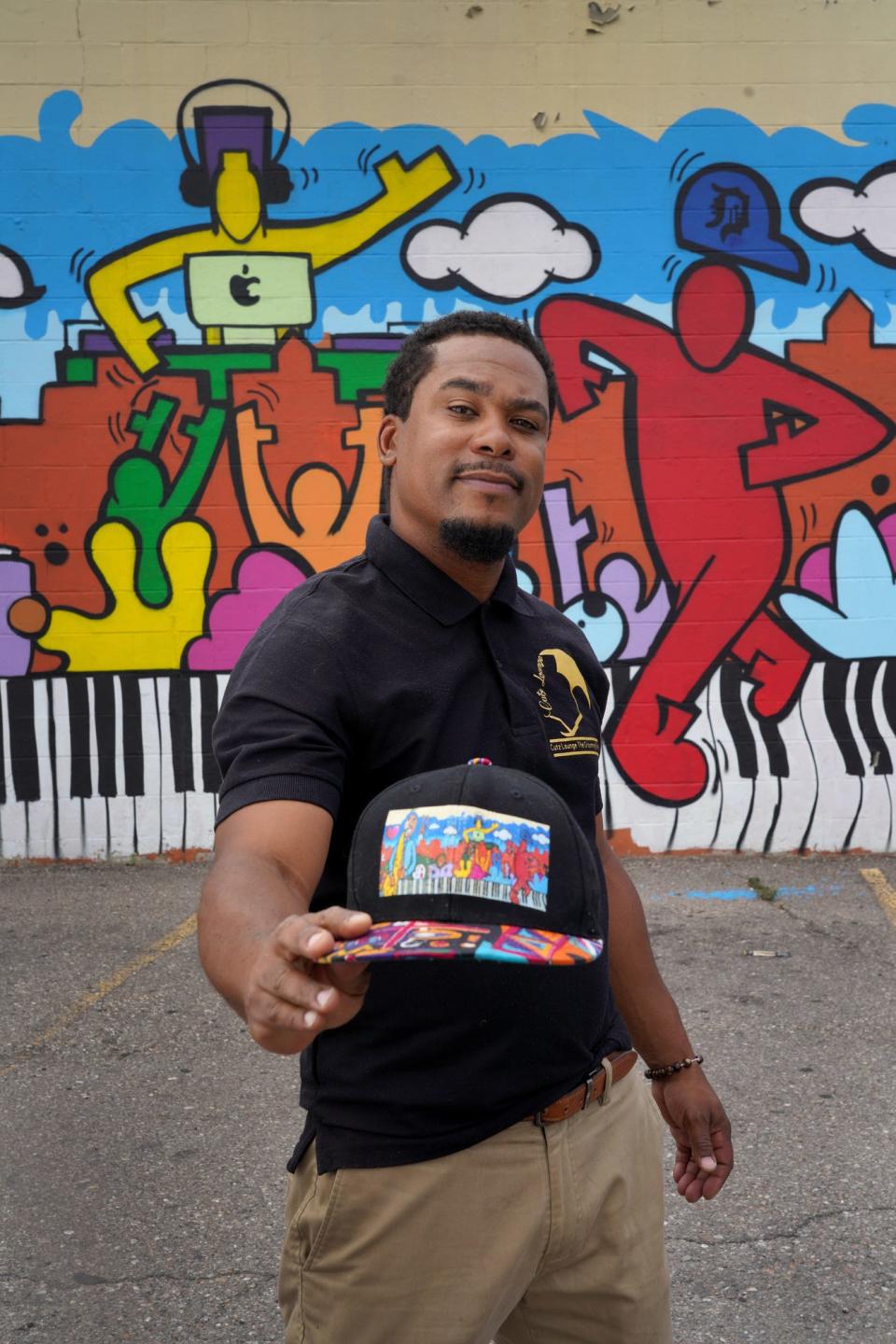 Dante Williams, owner of Cutz Lounge, a barbershop and gathering place in Detroit’s Grandmont Rosedale neighborhood, said his goal is to create a space where they “strive to bring back that same atmosphere that allows the barbershop to be the centerpiece of community engagement.”