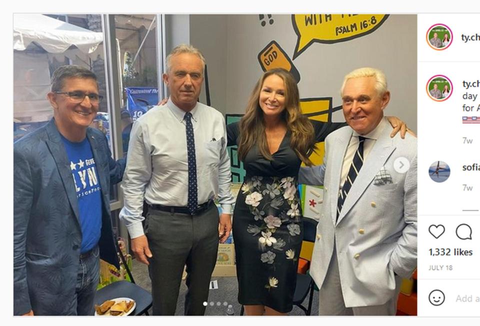 This screenshot of a photo posted on Instagram on July 18, 2021, shows Robert F. Kennedy Jr., second from left, with former National Security Adviser Michael Flynn, left, anti-vaccine business owner Charlene Bollinger and former President Donald Trump ally Roger Stone, right. Kennedy, now running for president as a Democrat, has portrayed himself as a true Democrat inheriting the mantle of the Kennedy family, yet he has associated with influential people on the far right. (AP Photo, File)