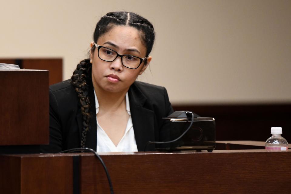 Katherine Magbanua sits on the witness stand waiting for court to be back in session following a lunch break Wednesday, Oct. 9, 2019. 