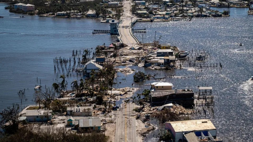An aerial picture taken on September 30, 2022, shows the only access to the Matlacha neighborhood destroyed in the aftermath of Hurricane Ian in Fort Myers, Florida. - Ricardo Arduengo/AFP/Getty Images