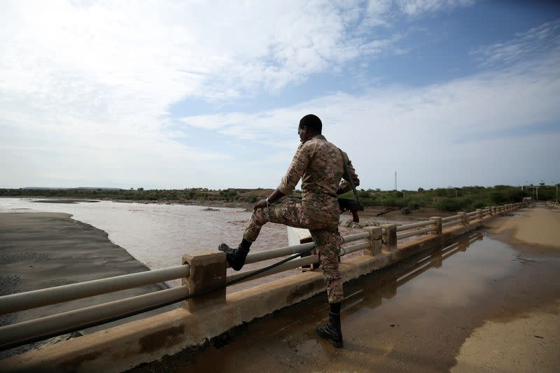 Member of the Amhara Special Forces stands guard on the Tekeze river bridge near Ethiopia-Eritrean border