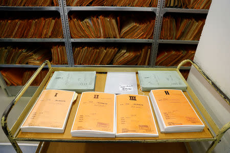 Copies of documents of the former East German Ministry for State Security (MfS), known as the Stasi, are pictured at the central archives office in Berlin, Germany, March 12, 2019. Picture taken March 12, 2019. REUTERS/Fabrizio Bensch