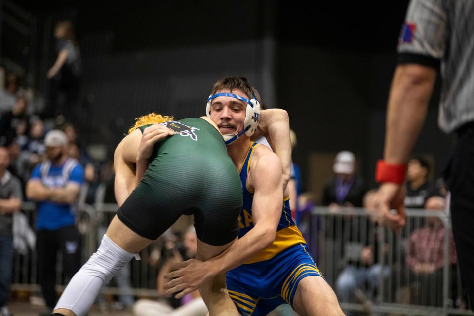 Washburn Rural's Chase Calhoon wrestles against Shawnee Mission South's Jackson Matchell in the 6A Boys State Wrestling tournament on Saturday, Feb. 24, 2024.