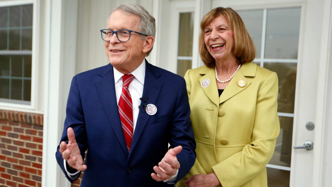 Gov. Mike DeWine, left, and first lady Fran DeWine meet with reporters outside of their polling place after voting in Cedarville, Ohio, on May 3. The DeWines will attend Sunday’s Mahoning Valley Scrappers game in Niles to promote the Ohio Governor’s Imagination Library program.